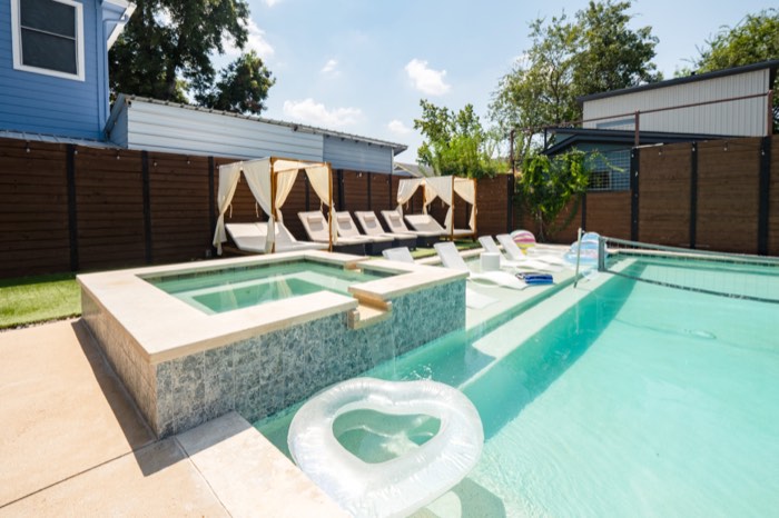 Heated spa with pool float
